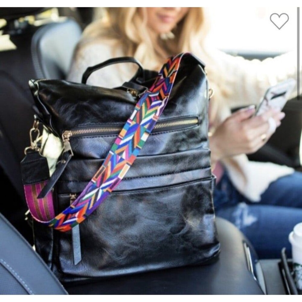 Black backpack purse with guitar strap